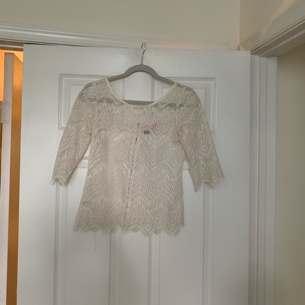 Lace overlay. Zip back. Ivory.